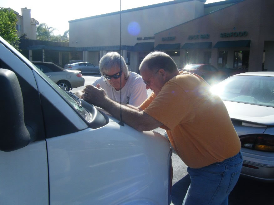 CA - San Diego - Howie and Bob praying at the health food store